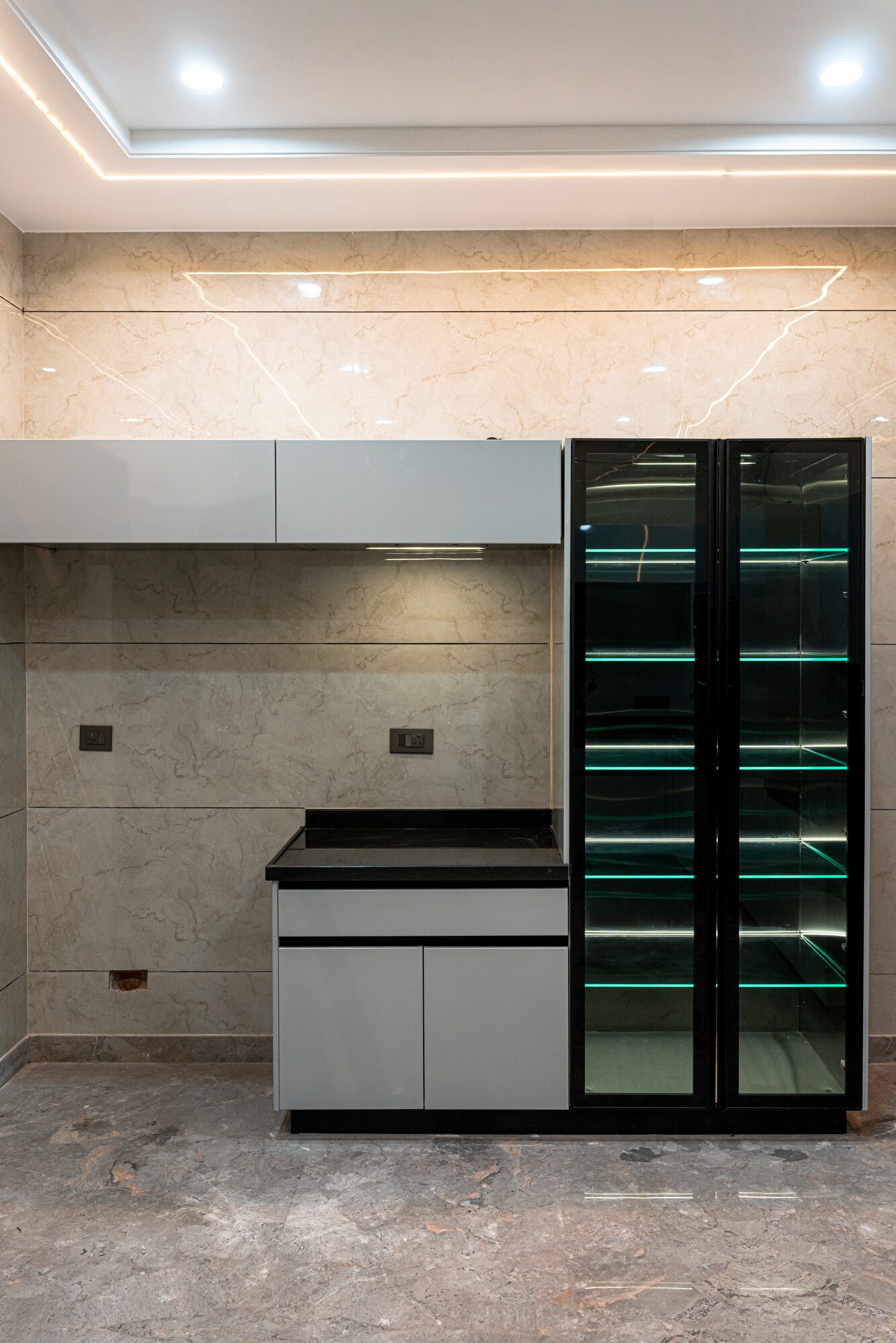 Glass-fronted display cabinet with LED shelving