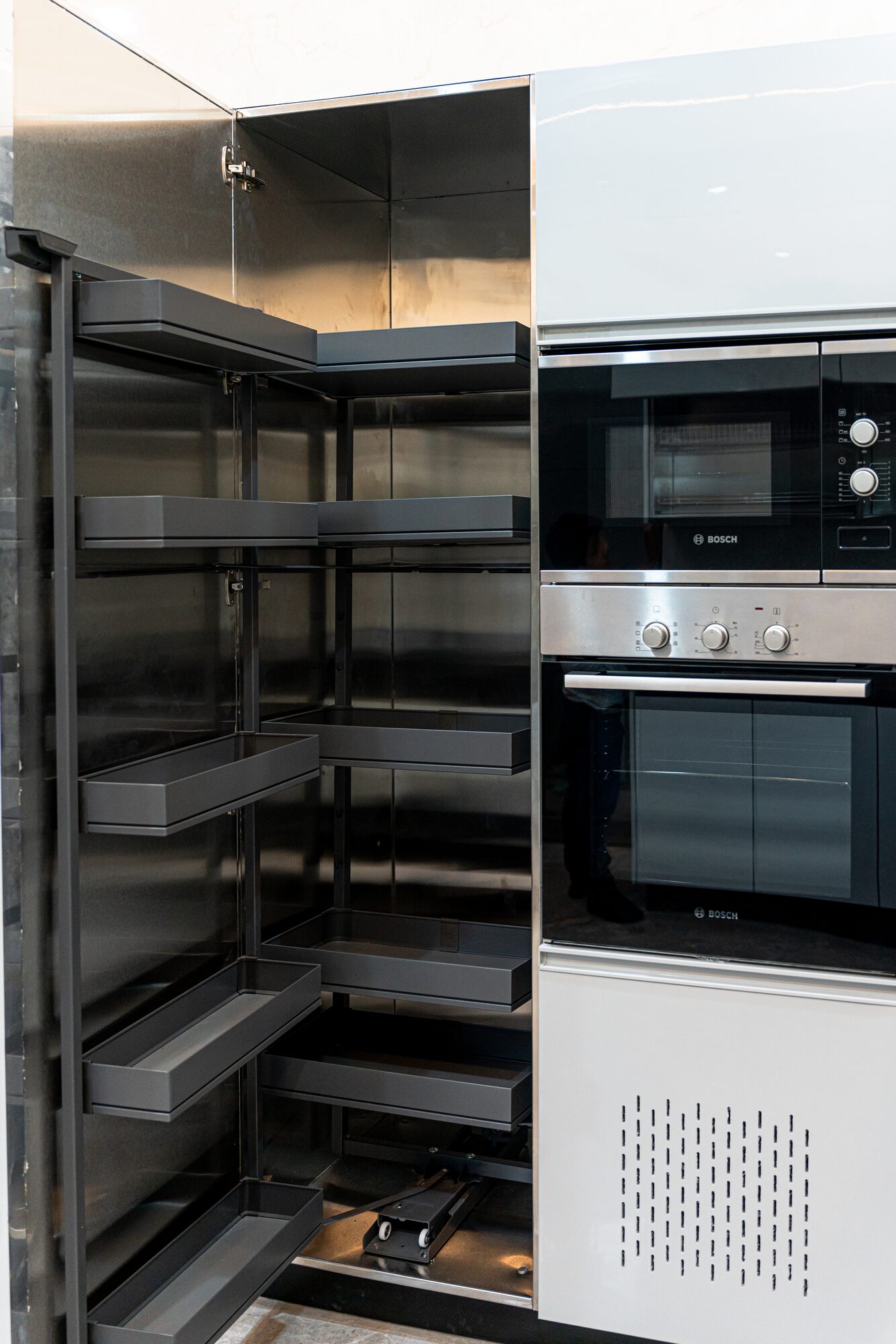 Pull-out pantry unit with steel shelving